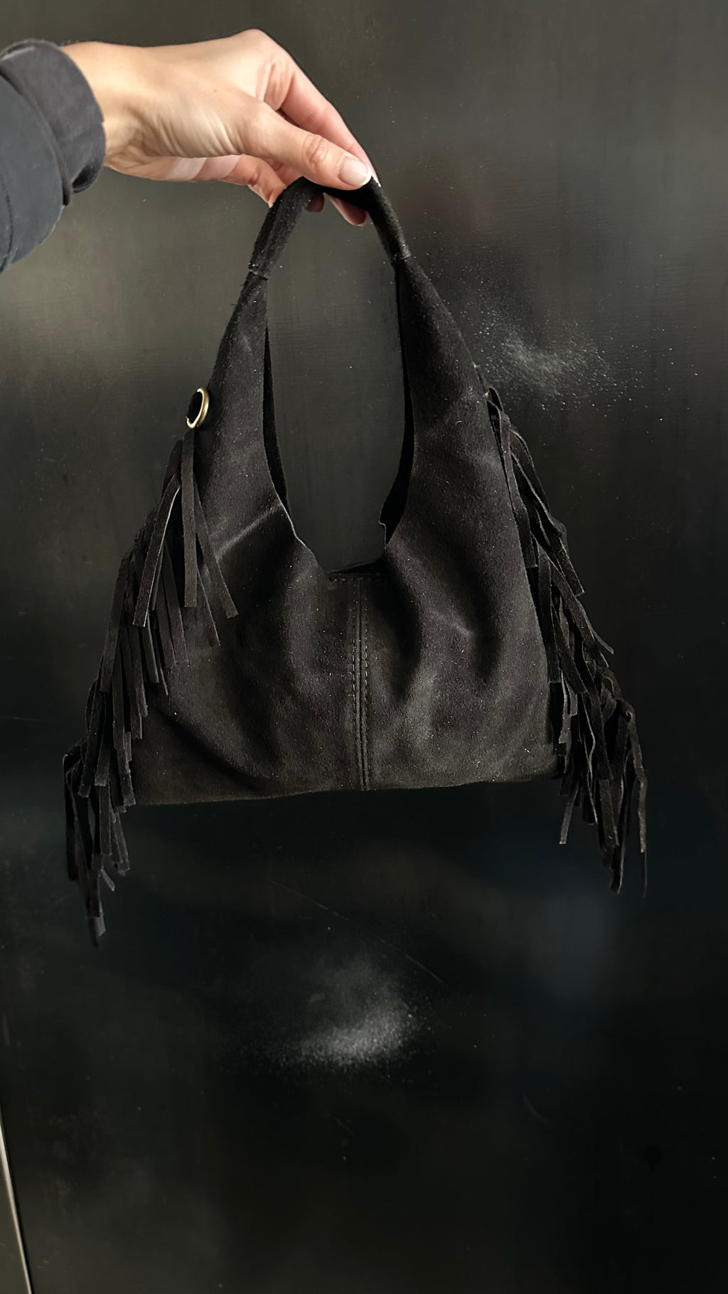Borsa in camoscio sfrangiata