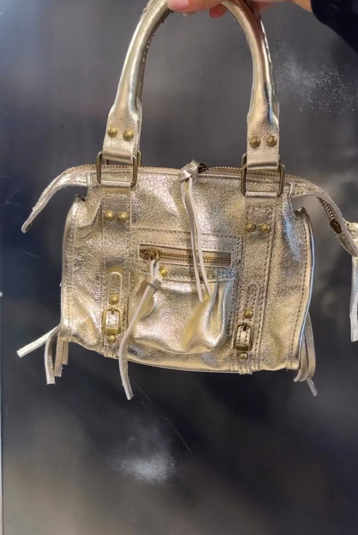 Borsa in pelle lucida con borchie tonde e lacci NK nekromancie